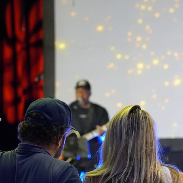 People worshiping together during a Fresh Hope Sunday gathering.